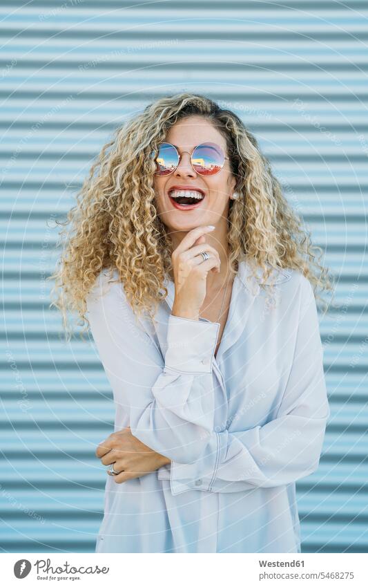 Portrait of laughing young woman with sunglasses human human being human beings humans person persons caucasian appearance caucasian ethnicity european 1