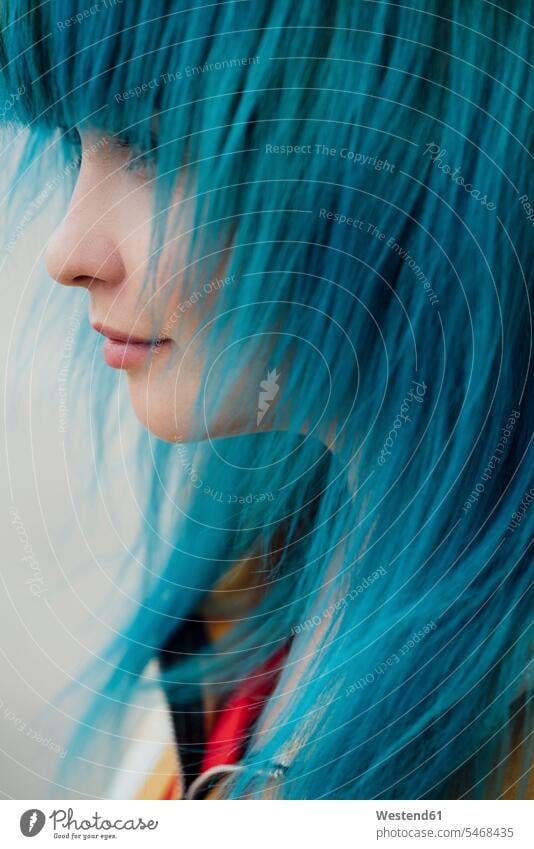 Young woman with dyed blue hair, close-up females women coloured Adults grown-ups grownups adult people persons human being humans human beings colours