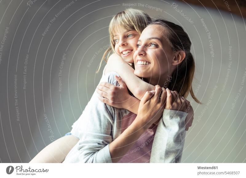 Mother and daughter playing at home, piggyback human human being human beings humans person persons caucasian appearance caucasian ethnicity european adult