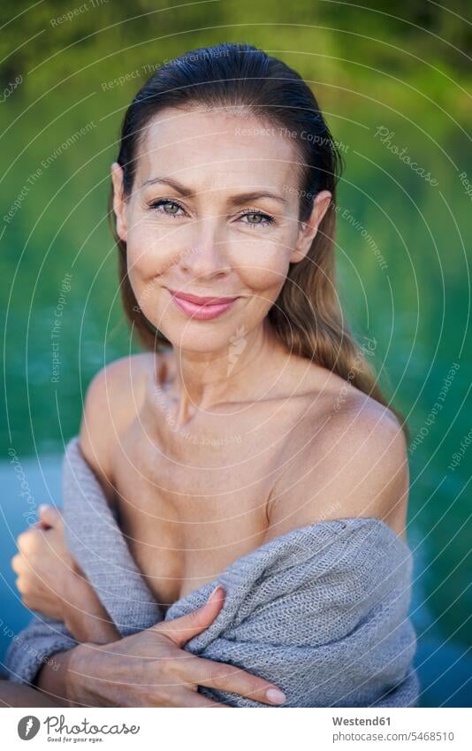 Portrait of mature woman at a lake human human being human beings humans person persons caucasian appearance caucasian ethnicity european 1 one person only