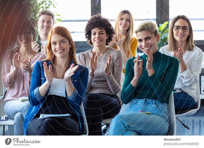 Businesswomen clapping hands during a training Occupation Work job jobs profession professional occupation business life business world business person
