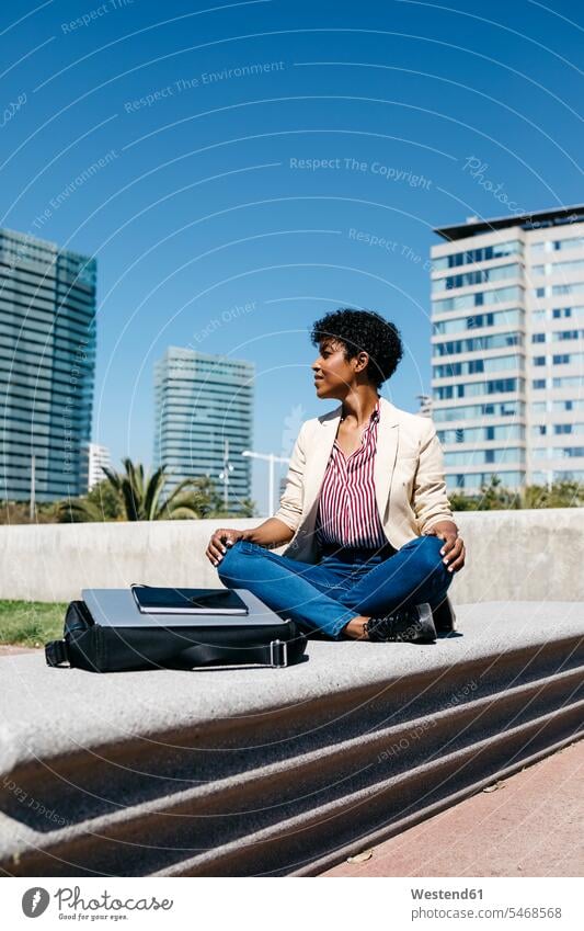 Businesswoman sitting on bench and, laptop and tablet on bag business life business world business person businesspeople business woman business women