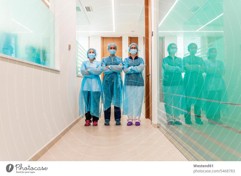 Female doctor and nurses in corridor at dentist's clinic color image colour image indoors indoor shot indoor shots interior interior view Interiors Spain
