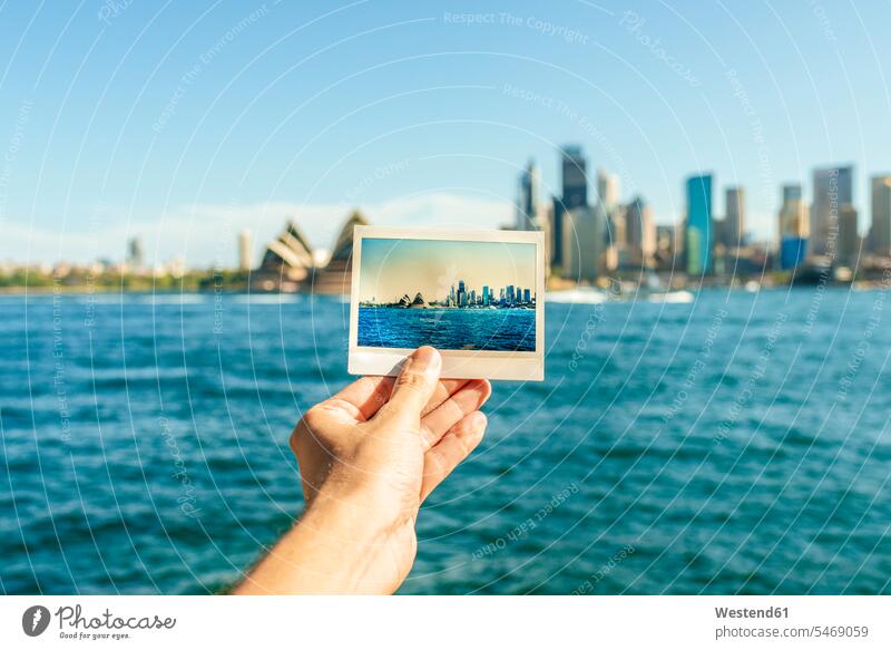 Australia, New South Wales, Sydney, close-up of Sydney landscape analog photography in front of Sydney photographing blue sky blue skies clear sky one person 1