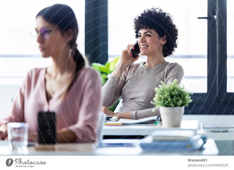 Businesswoman phoning at the office Occupation Work job jobs profession professional occupation business life business world business person businesspeople