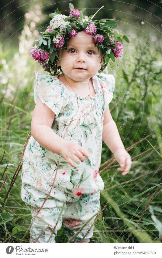 Portait of cute little girl with flower wreath on her head human human being human beings humans person persons caucasian appearance caucasian ethnicity