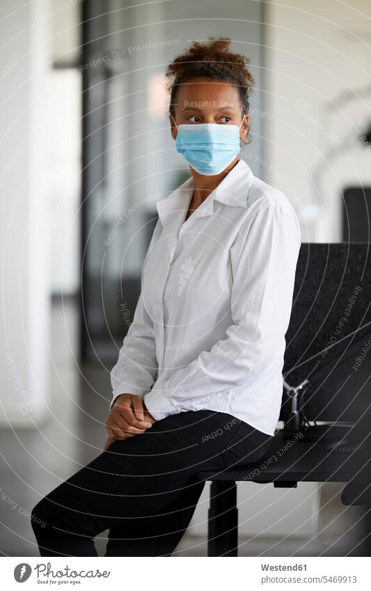 Portrait of businesswoman wearing light blue protective mask business life business world business person businesspeople business woman business women