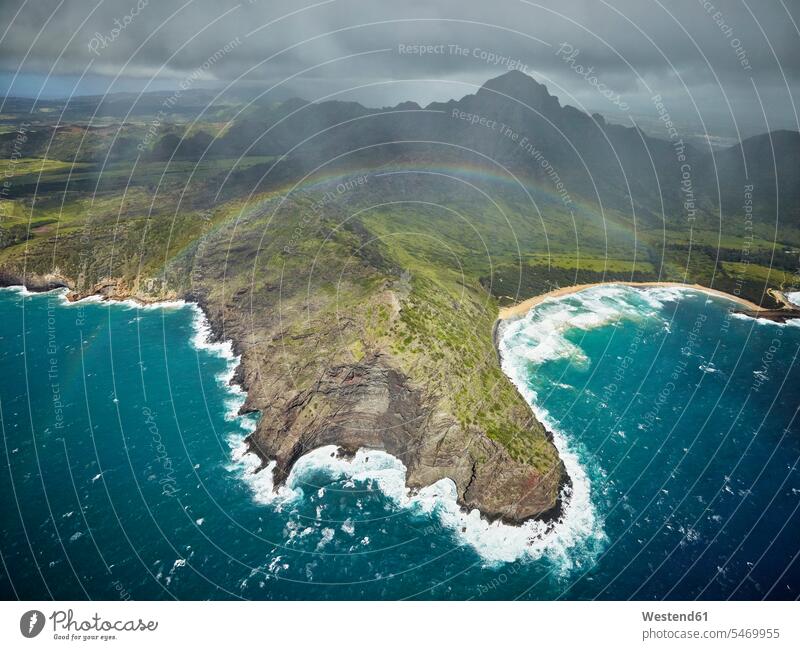 USA, Hawaii, Kauai, rainbow over Na Pali Coast, aerial view View Vista Look-Out outlook water's edge waterside shore Travel rainbows Pacific Ocean scenics