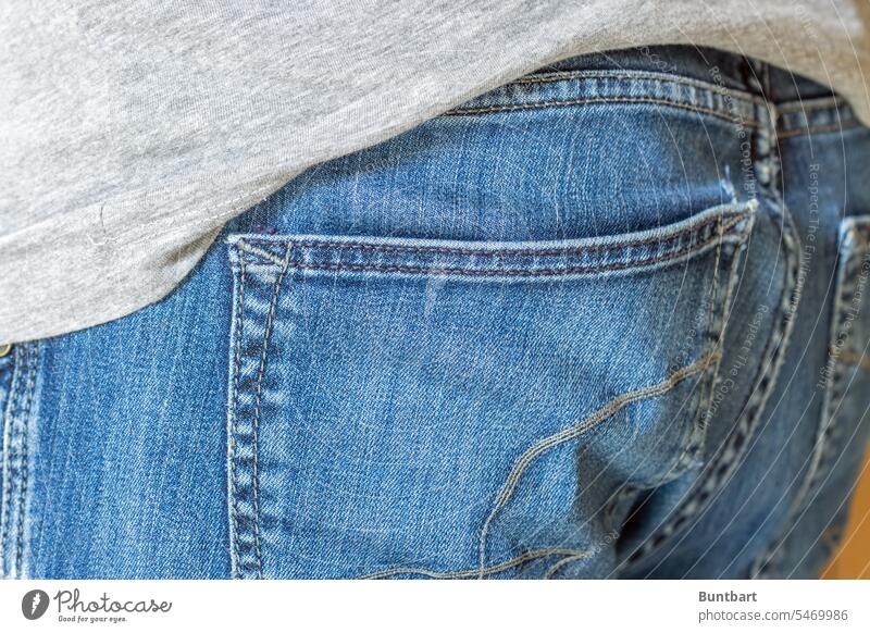 Grey shirt over blue jeans buttocks behind Close-up Human being Bottom Rear view person Gray Blue Pants Slim Body Easygoing Fashion Style style Denim Jeans