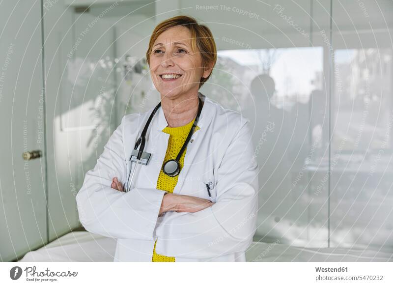Portrait of confident doctor Occupation Work job jobs profession professional occupation glass panes health healthcare Healthcare And Medicines medical medicine