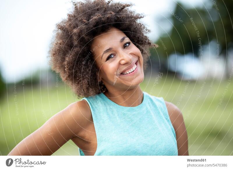 Portrait of happy woman outdoors smiling smile portrait portraits females women happiness Adults grown-ups grownups adult people persons human being humans