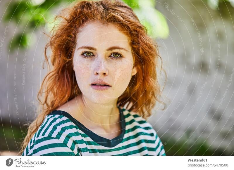 Portrait of redheaded young woman with freckles caucasian caucasian ethnicity caucasian appearance european day daylight shot daylight shots day shots daytime
