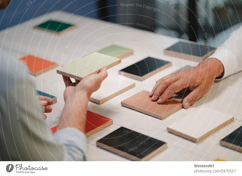 Hands of architects choosing colour samples in office human human being human beings humans person persons caucasian appearance caucasian ethnicity european 2