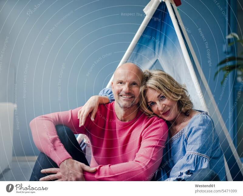 Portrait of smiling couple at teepee indoors Teepee Tepee Tipi portrait portraits twosomes partnership couples smile people persons human being humans
