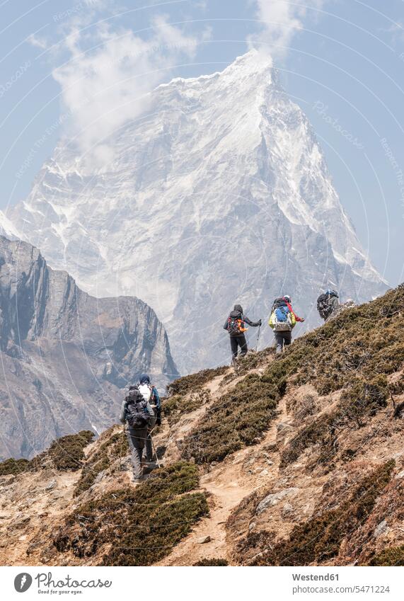 Nepal, Solo Khumbu, Everest, Group of mounaineers hiking at Dingboche Asian Ethnicity Asians nature natural world mountain range mountains mountain ranges