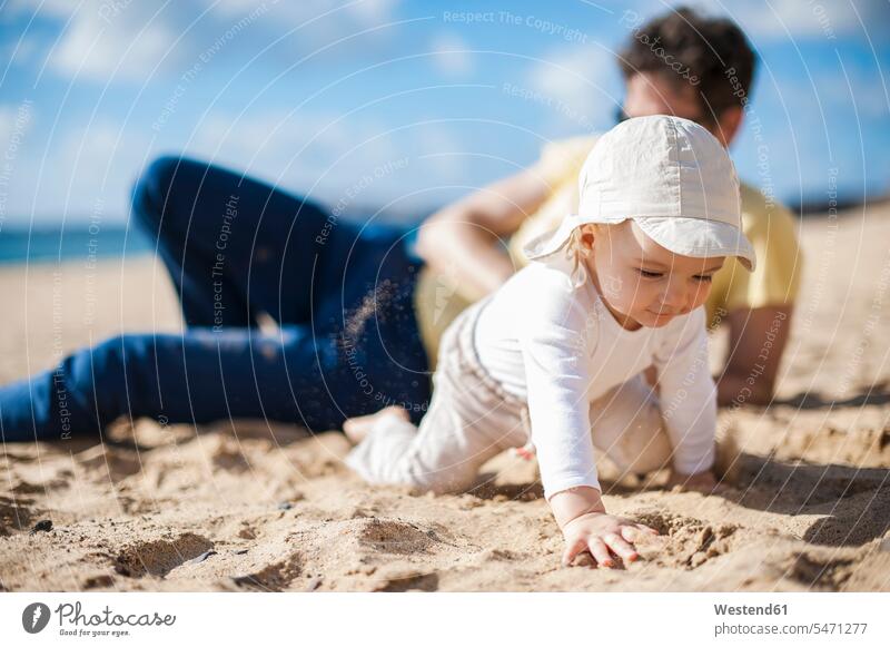 Spain, Lanzarote, baby girl crawling on the beach infants nurselings babies daughter daughters people persons human being humans human beings child children