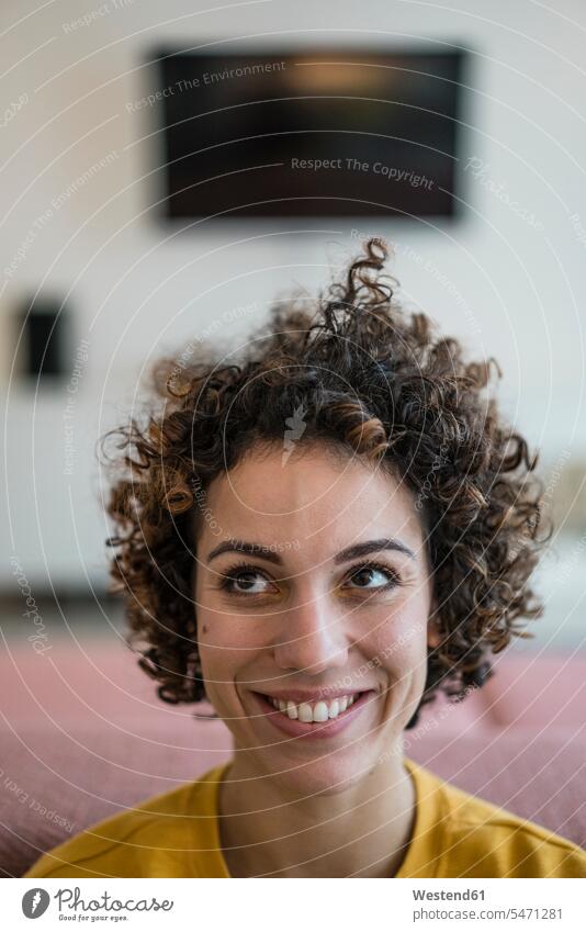 Portrait of smiling woman at home smile females women portrait portraits Adults grown-ups grownups adult people persons human being humans human beings