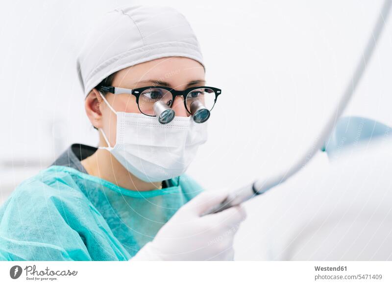 Portrait of dentist with loupe and mask human human being human beings humans person persons caucasian appearance caucasian ethnicity european 1 one person only