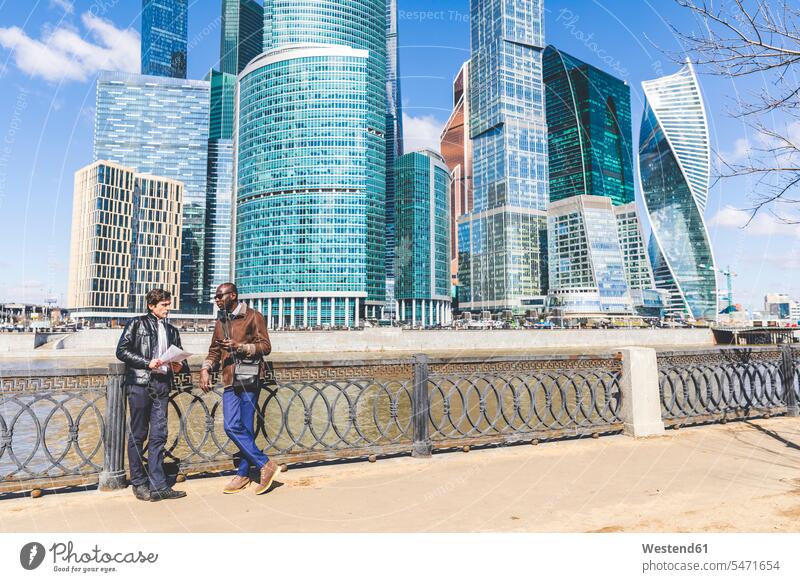 Russia, Moscow, two businessmen in the city Businessman Business man Businessmen Business men business people businesspeople business world business life