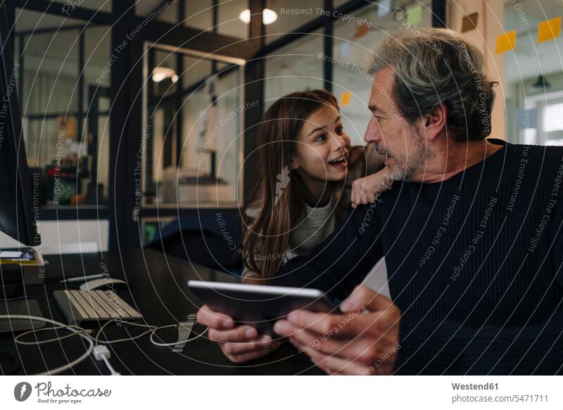 Casual senior buisinessman and girl with tablet in office human human being human beings humans person persons caucasian appearance caucasian ethnicity european