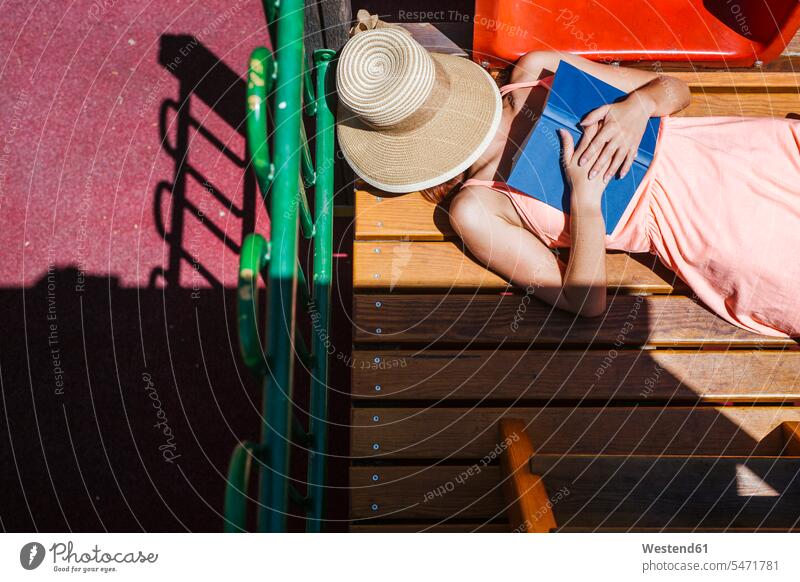 Woman with book having a rest books relax relaxing read summer time summertime summery colour colours Rosy free time leisure time Holidays Summer Holiday