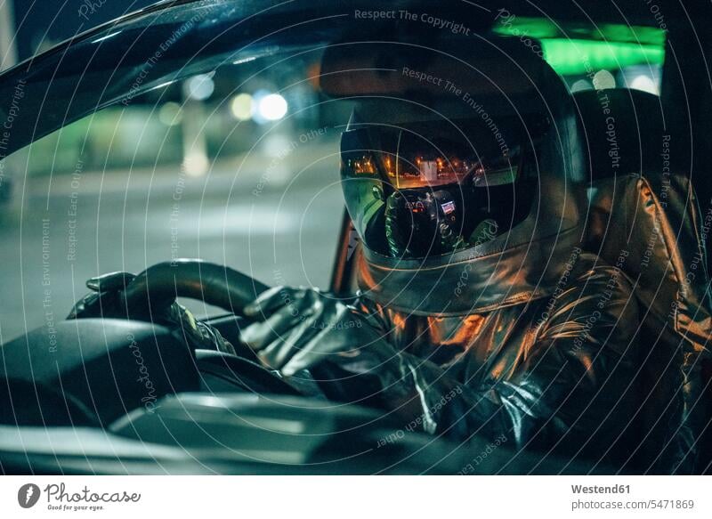 Spaceman driving car at night spaceman spacemen by night nite night photography drive car driving motoring automobile Auto cars motorcars Automobiles astronaut