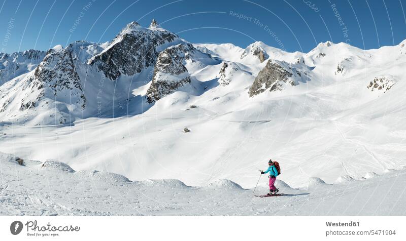 Switzerland, Grand Saint Bernard Pass, Pain de Sucre, Mont Fourchon, woman ski touring in the mountains females women Ski mountaineering Ski Touring ski tours