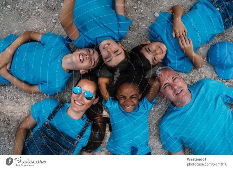 Group of people happy lying on the ground human human being human beings humans person persons caucasian appearance caucasian ethnicity european North African