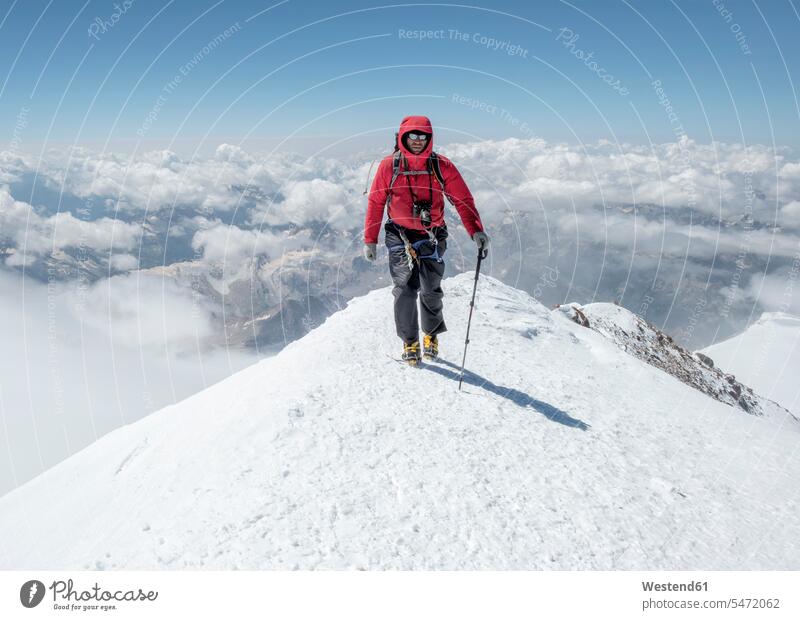 Russia, Upper Baksan Valley, Caucasus, Mountaineer ascending Mount Elbrus mountaineering ascent peak mountain peak mountain peaks Caucasus Mountains