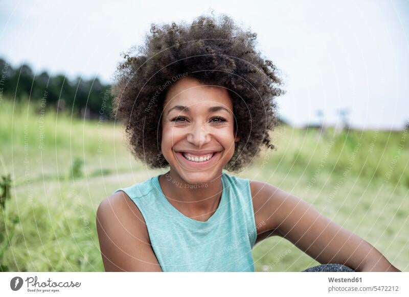 Portrait of happy woman outdoors smiling smile happiness portrait portraits females women Adults grown-ups grownups adult people persons human being humans