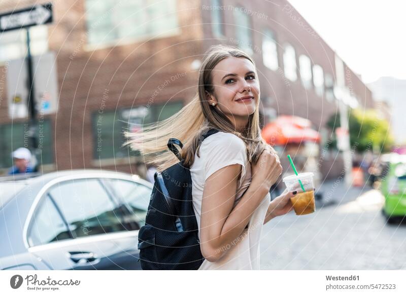Young woman exploring New York City, crossing street go going walk explore Alimentation food Food and Drinks Nutrition Beverage beverages human human being