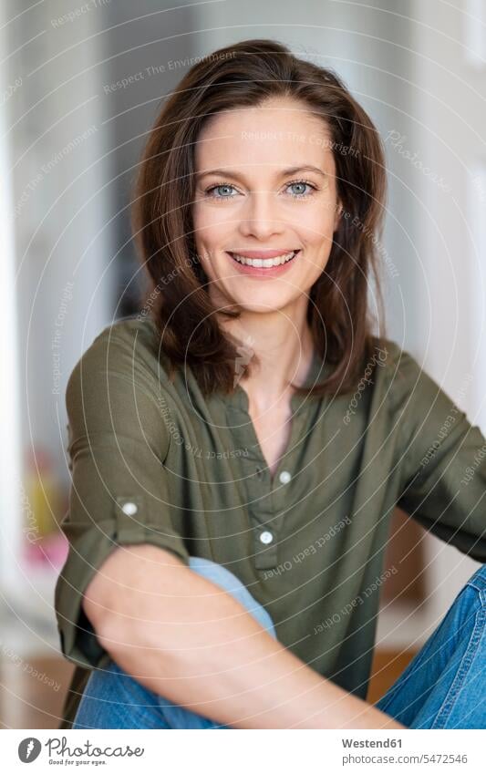 Portrait of smiling woman with brown hair smile females women portrait portraits Adults grown-ups grownups adult people persons human being humans human beings