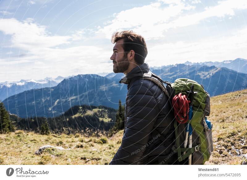 Austria, Tyrol, young man in mountainscape looking at view View Vista Look-Out outlook men males hiking hike mountain range mountain ranges mountainscapes