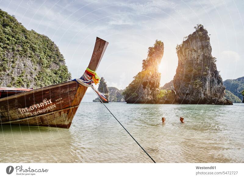 Thailand, Phang Nga Bay, moored long-tail boat boy boys males girl females girls vacation Holidays boats child children kid kids people persons human being