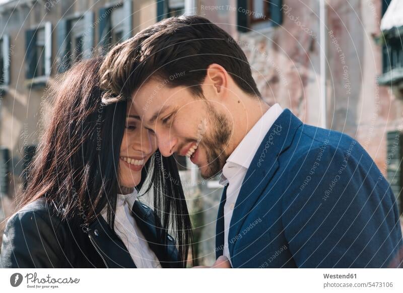 Italy, Venice, happy affectionate couple in the city Affection Affectionate town cities towns twosomes partnership couples happiness outdoors outdoor shots