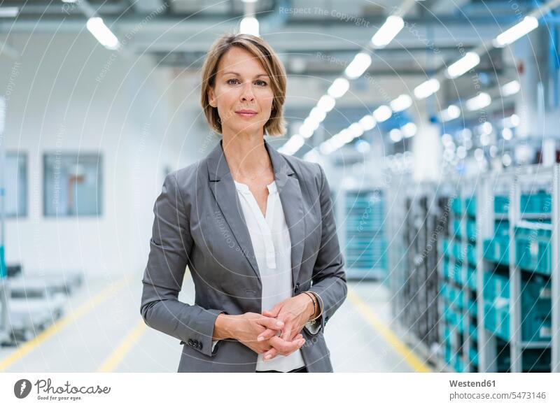 Portrait of a confident businesswoman in a modern factory Occupation Work job jobs profession professional occupation business life business world