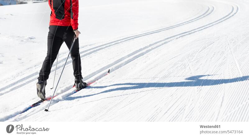 Austria, Tyrol, Achensee, close-up of man doing cross country skiing men males cross-country skiing winter hibernal Adults grown-ups grownups adult people