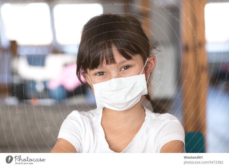 Girl wearing mask at home human human being human beings humans person persons Mixed Race mixed race ethnicity mixed-race Person 1 one person only