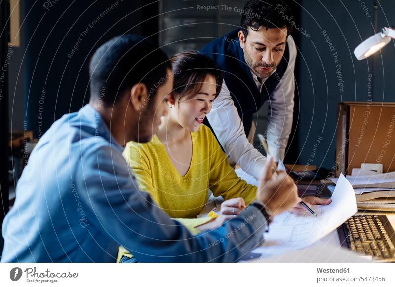 People working together in architect's office human human being human beings humans person persons Middle Eastern caucasian appearance caucasian ethnicity