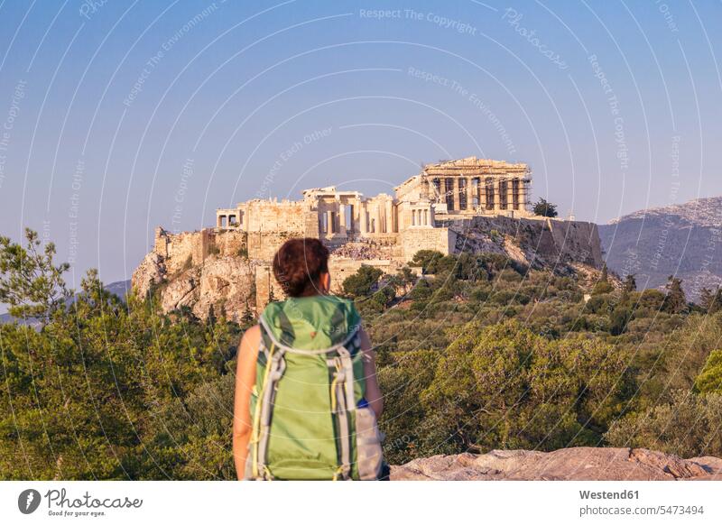 Greece, Athens, Tourist looking to the Acropolis from Pnyx caucasian caucasian ethnicity caucasian appearance european Travel destination Destination