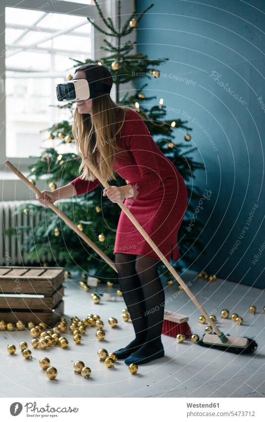 Woman using Virtual Reality Glasses at Christmas time VR glasses Virtual-Reality Glasses virtual reality headset vr headset vr goggles
