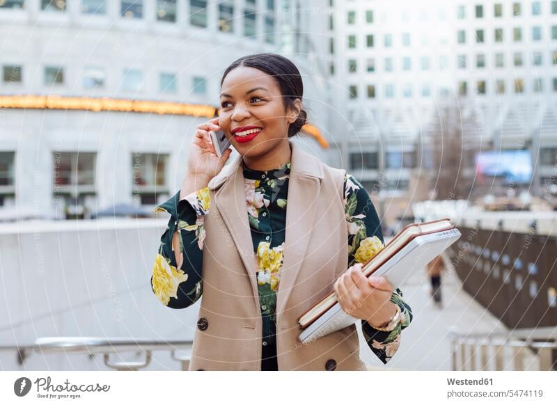 UK, London, portrait of fashionable businesswoman on the phone call telephoning On The Telephone calling businesswomen business woman business women portraits