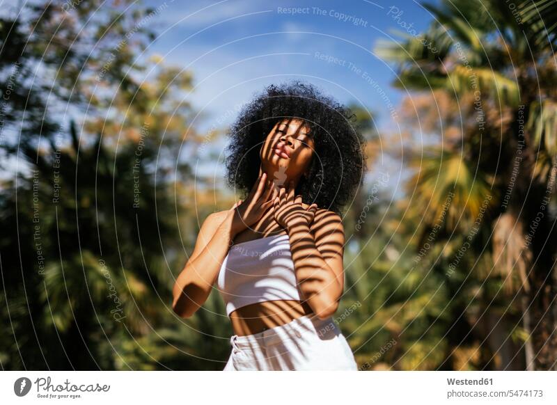 Portrait of young woman with shadow on her body relax relaxing relaxation White Colors stand free time leisure time protect protecting Attractiveness beautiful