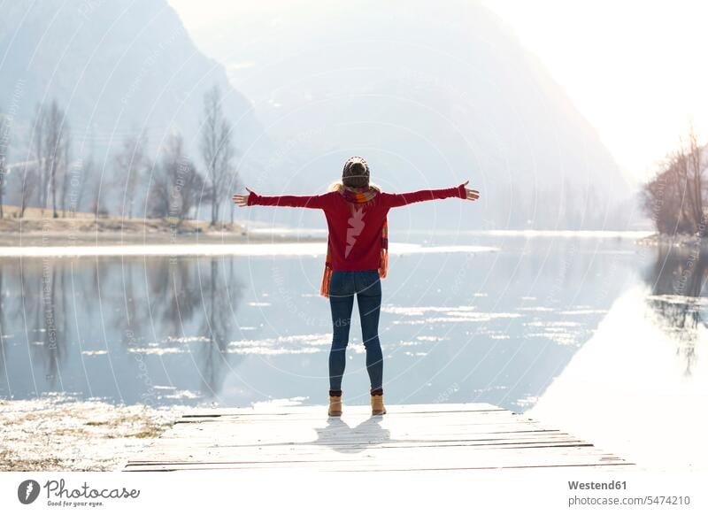 Young blond woman at a lake in winter human human being human beings humans person persons caucasian appearance caucasian ethnicity european adult grown-up