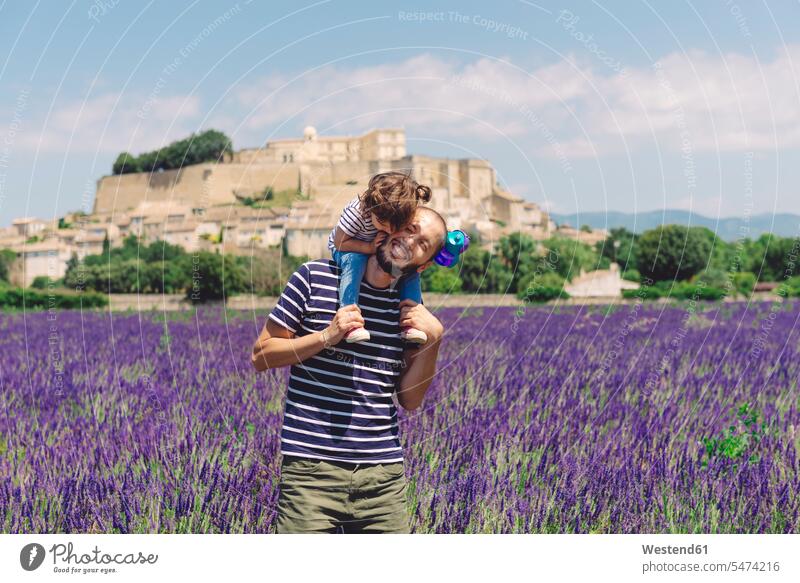 France, Grignan, father and little daughter having fun together in lavender field pa fathers daddy dads papa daughters Fun funny Field Fields farmland parents
