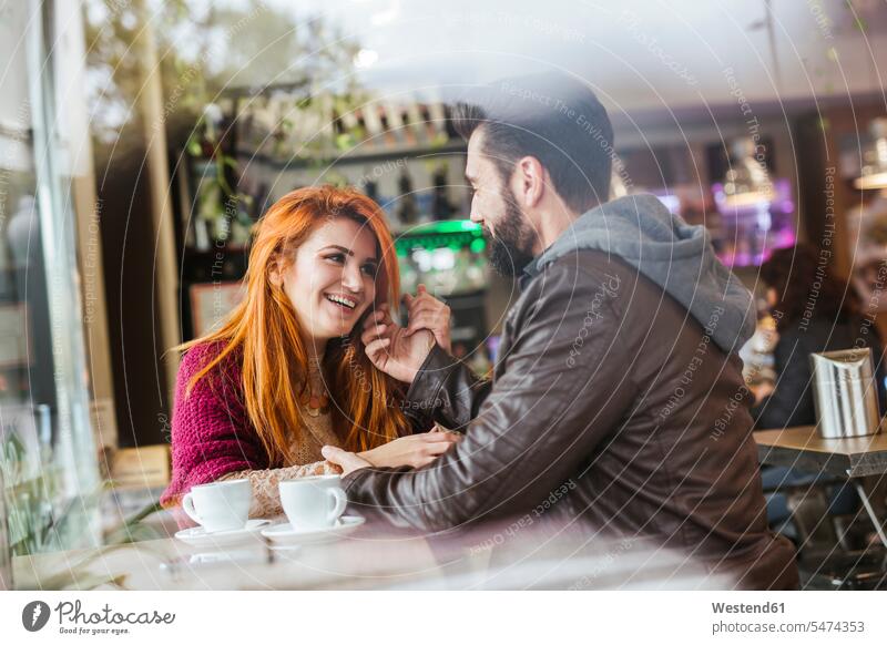 Couple in love in a coffee shop human human being human beings humans person persons caucasian appearance caucasian ethnicity european 2 2 people 2 persons two