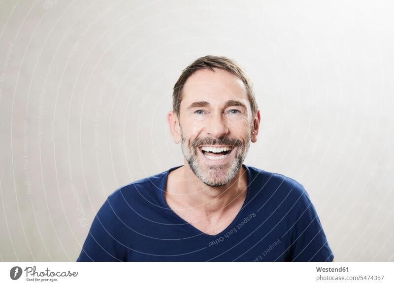 Portrait of smiling mature man smile laughing Laughter looking at camera looking to camera looking at the camera Eye Contact men males portrait portraits