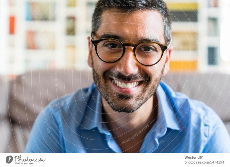 Portrait of happy young man wearing glasses at home human human being human beings humans person persons caucasian appearance caucasian ethnicity european 1