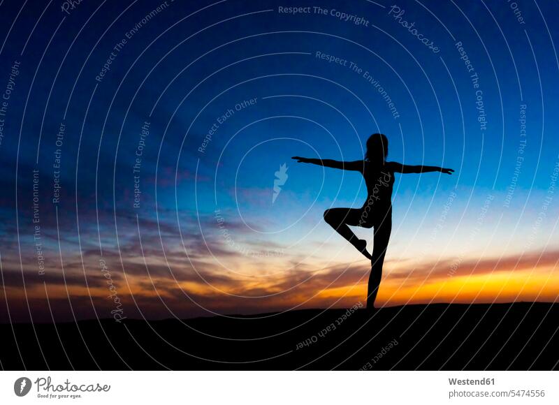 Silhouette of woman dancing at sunset, Gran Canaria, Spain human human being human beings humans person persons caucasian appearance caucasian ethnicity