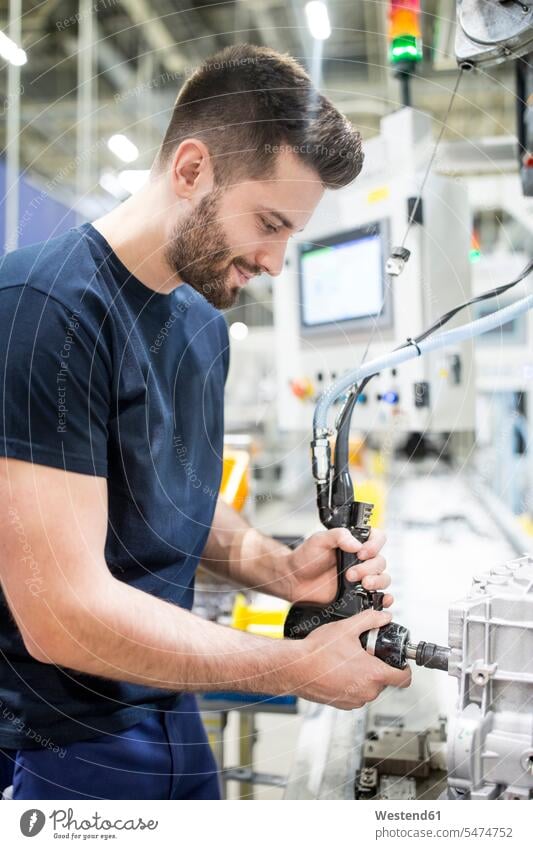 Man working in a modern factory Occupation Work job jobs profession professional occupation blue collar blue collar worker blue-collar worker workers T- Shirt
